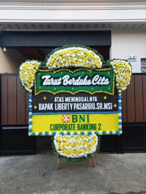 Papan Bunga Duka di Tutulo