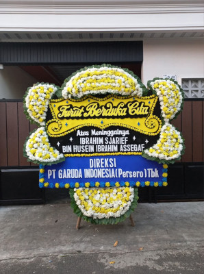 Papan Bunga Duka di Tutulo