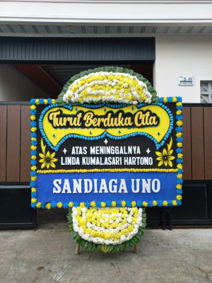 Papan Bunga Duka di Tutulo