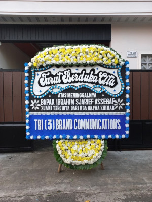 Papan Bunga Duka di Tutulo
